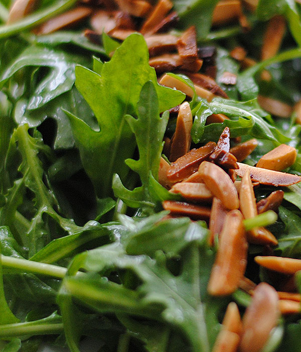 Arugula with Shallot Confit Vinaigrette and Toasted Almonds Recipe