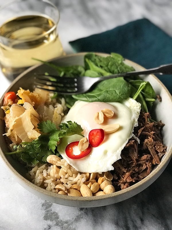 Korean Beef Bowl | bowls of beef, spinach, rice or veggies, kimchi, peanuts, cilantro and an over easy egg. #shemadeit #Koreanbeef #healthyfood #instantpot #foodie #glutenfree #foodblogger #reacipe #protein #spinach #grainbowl #putaneggonit #winterfood #onthetable #foodgawker #dinnertime #mealprep #whatsfordinner #whole30 #loveyourlunch #feedfeed #f52grams #realfood #buzzfeedfood @thefeedfeed #instafood #eater #tacos #beefbowl | shemadeitshemight.com