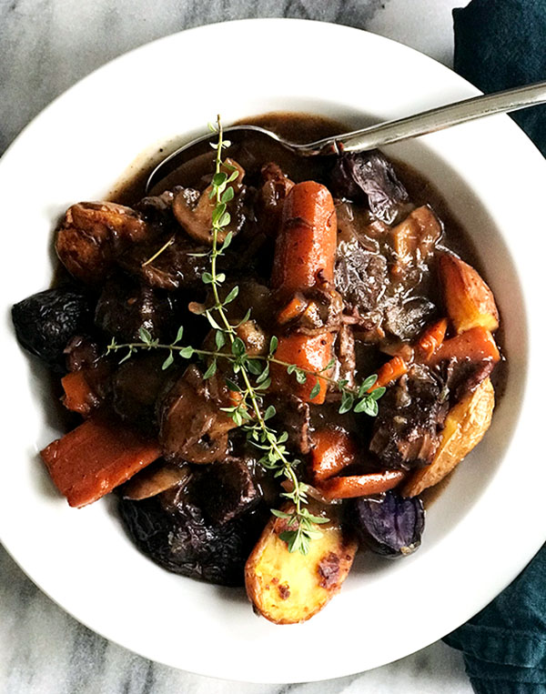 How to make beef bourguignon in the Instant Pot. #shemadeit #winterfood #slowcooking #instantpot #beefstew #beefburgundy #recipe #redwine #cookingiwthwine #makeahead #companyiscoming #fallfood #comfortfood