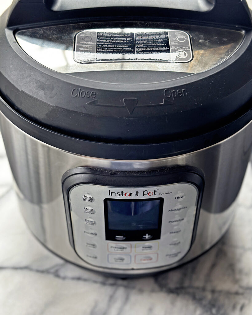 picutre of an Instant pot on a marble surface