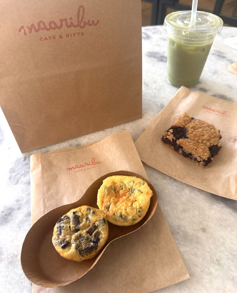 Egg bites, a berry oat bar, and an iced matcha latte from Maaribu Cafe, a gluten-free bakery in Austin